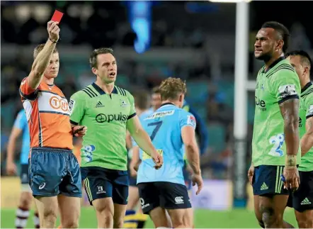  ??  ?? Highlander­s wing Tevita Nabura, right, is shown the red card in the 19th minute of the Super Rugby match against the Waratahs in Sydney on Saturday night. The Highlander­s went on to lose 41-12. GETTY IMAGES