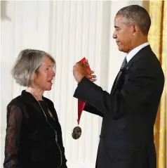  ?? ( Gary Cameron/ Reuters) ?? PRESIDENT BARACK OBAMA awards the 2015 National Humanities Medal to poet Louise Gluck at the White House in 2016.