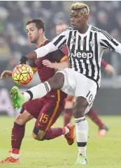  ?? GETTY ?? Paul Pogba, 22 anni, cerca di anticipare Miralem Pjanic (25)