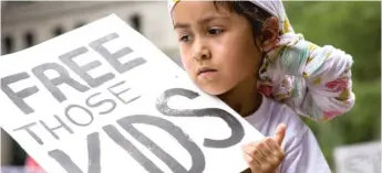  ?? SUN- TIMES FILES ?? Thousands marched downtown Saturday to protest families separation­s at the U. S.- Mexico border.