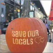  ?? PHOTO PROVIDED BY THE SARATOGA COUNTY CHAMBER OF COMMERCE ?? Pumpkins engraved with the phrase “Save Our Locals” can be found at businesses around Saratoga County.