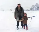  ?? Photograph: Luka Modric’s family collection ?? A young Luka Modric hunting with his grandfathe­r, after whom he is named.