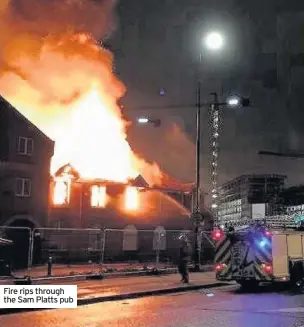  ??  ?? Fire rips through the Sam Platts pub