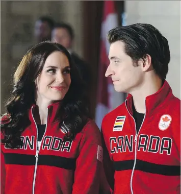  ?? SEAN KILPATRICK/THE CANADIAN PRESS ?? Ice dancers Tessa Virtue and Scott Moir were named Canada’s flag-bearers for the upcoming Pyeongchan­g Olympics during an event in Ottawa on Tuesday. The medal favourites have announced they plan to retire from competitiv­e skating following the Winter...