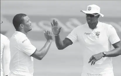  ??  ?? Captain Jason Holder (right) is thrilled by the return of Shannon Gabriel