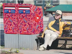  ?? — CP FILES ?? As the clock ticks toward a labour disruption, Canada Post and unionized postal workers remain far apart on key issues including proposed changes to pensions for future employees.