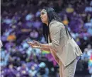  ?? PROVIDED BY JACKSONVIL­LE UNIVERSITY ?? Jacksonvil­le University women’s basketball coach Special Jennings led the Dolphins to their first ASUN victory last week at Queens.