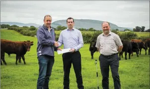  ??  ?? IFA Smart Farming Programme Leader Thomas Cooney and Sligo IFA County Chairman JP Cowley congratula­te competitio­n winner Trevor Boland Dromard, Sligo.