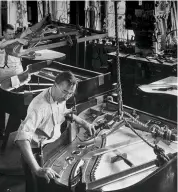  ??  ?? Frame at last: workers at the Steinway factory, 1934