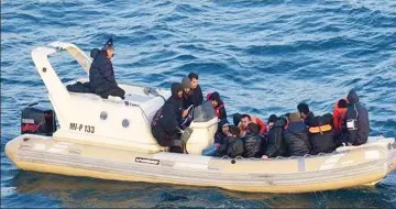  ??  ?? Found: The motorised boat that brought 34 migrants, including women and children, across the Channel at St Margaret’s Bay, near Dover, in February last year