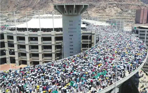  ?? AFP ?? The walkway leading to the pillars where pilgrims take part in the symbolic stoning of the devil at theJamarat Bridge in Mina yesterday. The Haj, which started on Sunday and ends today, drew nearly 2.4 million pilgrims from around the world this year.