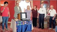  ?? Jeremy stewart ?? Georgia Exchange District 1 President Elect JP Cooper (second from left) gives the oath of installati­on to the new officers of the Exchange Club of Cedartown during a ceremony last Thursday. Shown are Immediate Past President Oscar Guzman (from left), President Jane Holbrooks Hamlett, President Elect Angela Foster Moore, Treasurer Dan Riley, and Secretary Walt Ruppert Jr.