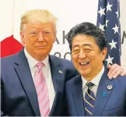  ?? /Reuters ?? Mutual benefits: US President Donald Trump and Japanese Prime Minister Shinzo Abe.