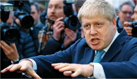  ??  ?? Electrifyi­ng the referendum campaign: Boris Johnson outside his London home yesterday