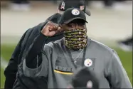  ?? KEITH SRAKOCIC - THE ASSOCIATED PRESS ?? Pittsburgh Steelers head coach Mike Tomlin celebrates as he walks off the field following a win over the Cincinnati Bengals during an NFL football game, Sunday, Nov. 15, 2020, in Pittsburgh.