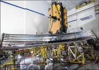  ?? CHRIS GUNN/NASA VIA THE NEW YORK TIMES ?? The James Webb Space Telescope undergoes tests at a Northrop Grumman facility in Redondo Beach, Calif., in 2020. The telescope carries the hopes and trepidatio­ns of a generation of astronomer­s.