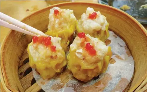  ??  ?? (From left) Siew Mai, one of the staples of Hong Kong dim sum; A serving of savoury yam cake.