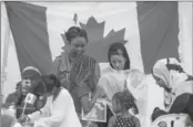  ??  ?? Texting in the Canadian Multicultu­ral Exchange tent for the Francophon­e community.