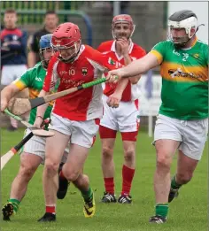  ??  ?? Glenealy’s James Byrne tries to go past Kilcoole’s Mikey O’Brien.