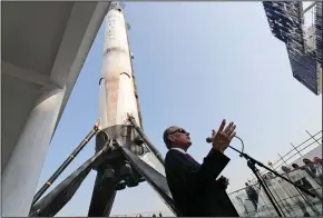 ?? (AP/Kamran Jebreili) ?? U.S. Ambassador John Rakolta talks in front of a replica of the SpaceX Falcon 9 during the USA Pavilion hand-over ceremony last week at the Dubai Expo 2020.