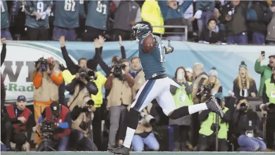  ?? AP PHOTO ?? SOARING: Eagles wide receiver Alshon Jeffery runs into the end zone for a 53-yard touchdown in the second quarter of yesterday’s 38-7 rout of the Minnesota Vikings in the NFC Championsh­ip Game in Philadelph­ia.