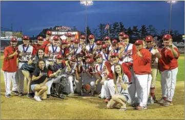  ??  ?? The Wilson baseball team celebrates with the county championsh­ip trophy after defeating Twin Valley in the final on May 17.