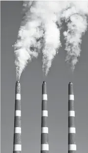  ?? TIM KROCHAK • SALTWIRE NETWORK ?? Smoke flows from the stacks at the Tufts Cove generating plant in Dartmouth Thursday, January 27, 2022.