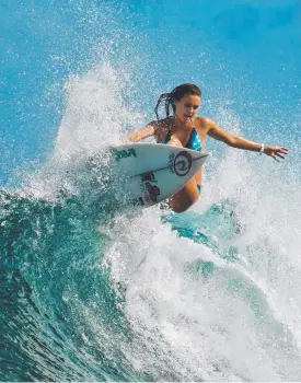  ?? Picture: KELLY CESTARI/WSL & RIP CURL ?? Jack Freestone and Alana Blanchard are skilfully balancing their family responsibi­lities with the demands of profession­al surfing.