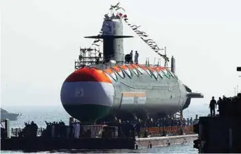  ?? ?? (Top) Torpedo firing trials of INS Kalvari, first Scorpene Submarine by MDL; (Above) Launch of INS Khanderi, the second of Indian Navy’s Scorpene class Stealth Submarine