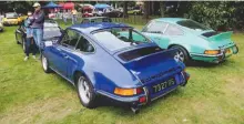  ??  ?? Bottom left: Quite possibly the best registrati­on number for a 1973 Carrera RS you could wish for!