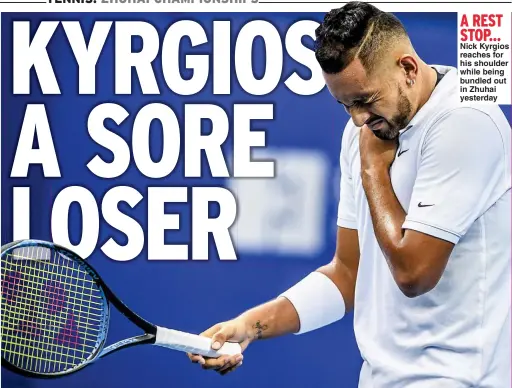  ??  ?? A REST STOP… Nick Kyrgios reaches for his shoulder while being bundled out in Zhuhai yesterday