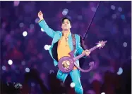  ?? AP PHOTO BY CHRIS O’MEARA ?? In this 2007 file photo, Prince performs during the halftime show at the Super Bowl XLI football game at Dolphin Stadium in Miami.