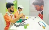  ?? DEEPAK GUPTA/ HT PHOTO ?? ▪ Candidates from Jammu & Kashmir representi­ng their state in robotics at the IndiaSkill­s Regional Competitio­n2018 in Lucknow on Thursday.