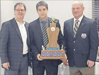 ?? PhOTO COURTeSy Of The NSMMhL ?? Millbrook’s G Blackmore won the Nova Scotia Major Midget Hockey League scoring title and MVP award this season. He collected his hardware on Friday during the league’s annual awards banquet. Also pictured are Corrado Micalef, (former NHL goaltender and...