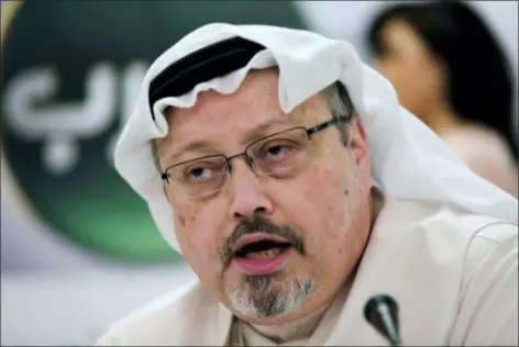  ?? ASSOCIATED PRESS ?? In this 2014 file photo, Saudi journalist Jamal Khashoggi speaks during a press conference in Manama, Bahrain. President Donald Trump says the U.S. will not levy additional punitive measures at this time against Saudi Arabia over the killing of Jamal Khashoggi.