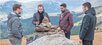  ?? VLAD CIOPLEA ?? Sam Troughton, left, Rafe Spall, Arsher Ali and Robert James-Collier are friends who take a fateful hiking trip in “The Ritual.”