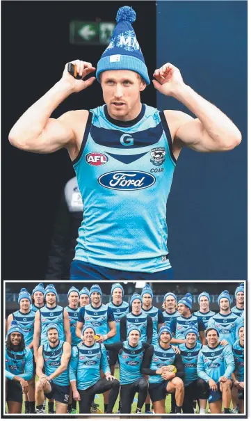 ?? Pictures: JAY TOWN ?? GOOD CAUSE: Midfielder Scott Selwood, main, and his Cats teammates, inset, show off their charitable spirit by donning the MND big freeze beanies at training yesterday.