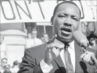  ?? Michael Ochs Archives / Getty Images file photo ?? Civil rights leader the Rev. Dr. Martin Luther King Jr. delivers a speech to a crowd of about 7,000 on May 17, 1967, at the University of California at Berkeley’s Sproul Plaza in Berkeley, Calif.