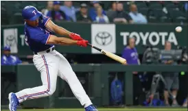  ?? SAM HODDE — THE ASSOCIATED PRESS ?? Wyatt Langford is one of MLB’s top prospects. The Rangers aren’t waiting long to bring him up either, with the slugger on the Opening Day roster after just 44minor league games last season.