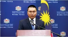  ?? — Bernama photo ?? Shahrul delivers his speech at the exchanging of diplomatic notes on Bilateral Work Arrangemen­t (BWA) between Malaysia and United Kingdom at Wisma Putra.