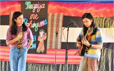  ?? PHOTOGRAPH COURTESY OF MAANYAG MARAMAG ?? PAOLO Benjamin and Miguel Benjamin of the Ben&Ben band perform before a local crowd in Maramag town on 14 March.