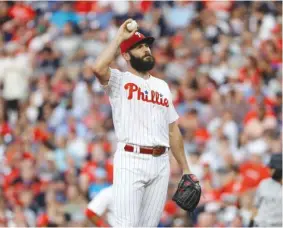  ?? MATT SLOCUM/ AP ?? The Phillies’ Jake Arrieta ran into more trouble Tuesday night against the visiting Yankees, allowing six runs, three of which were unearned, in five innings.