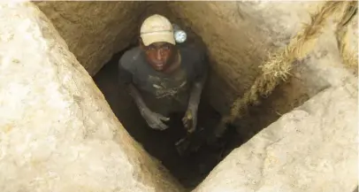  ??  ?? A miner at Rima site in Birnin Gwari Forest of Kaduna State