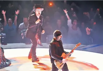  ?? — Reuters file photo ?? Bono (Left) and The Edge of U2 perform during the band’s “Experience + Innocence” tour at The Forum in Inglewood, California, US, May 16, 2018.