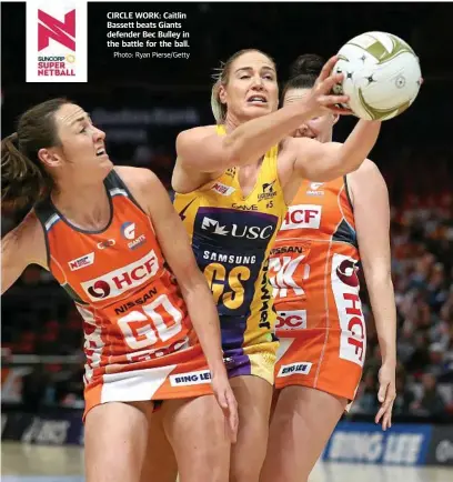  ?? Photo: Ryan Pierse/Getty ?? CIRCLE WORK: Caitlin Bassett beats Giants defender Bec Bulley in the battle for the ball.