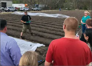  ?? Submitted photo by Julie Silva/YMCA ?? Project manager and farm team leader Todd Sandstrum shows off the rows of vegetable beds at the Bellingham Community Farm on Center Street.