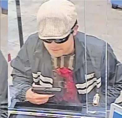  ??  ?? SMOKED OUT: A bank robber identified as Leonid Kaziyev flashes a gun in an UpperWest Side bank heist. He was linked to the crime by a DNA sample from a discarded cigarette, the FBI says.