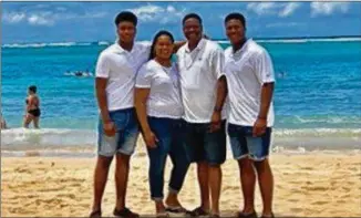  ?? PHOTO COURTESY OF TONYA DINGLE ?? Incoming Georgia Tech freshman Justice Dingle (right) recently went on vacation to Hawaii with his brother, Jordan (from left), his mother, Tonya, and father, Justice Sr.