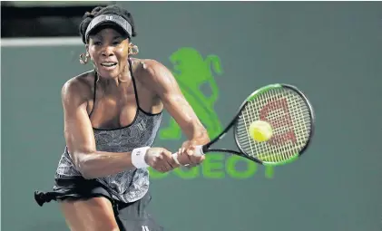  ?? USA TODAY SPORTS ?? Venus Williams hits a backhand against Angelique Kerber in their quarter-final match.