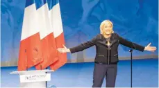  ?? FOTO: DPA ?? Marine Le Pen begrüßt ihre Anhänger in Lyon.